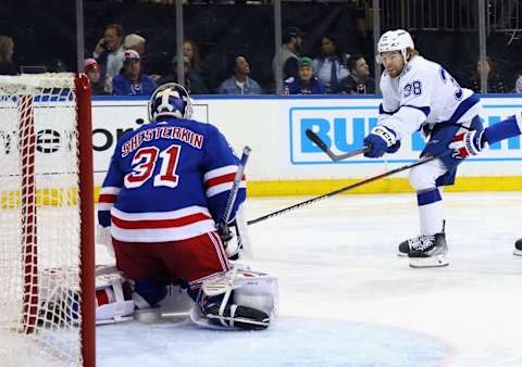 NEW YORK, NEW YORK – APRIL 05: Igor Shesterkin #31 of the New York Rangers makes the first-period stop on Brandon Hagel #38 of the Tampa Bay Lightning at Madison Square Garden on April 05, 2023, in New York City. (Photo by Bruce Bennett/Getty Images)