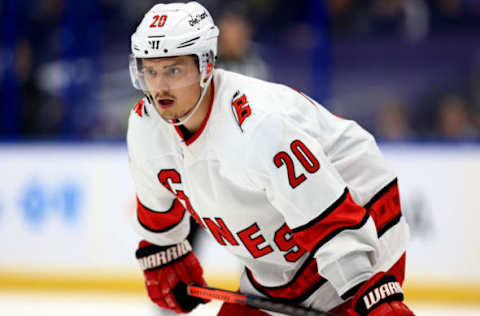 TAMPA, FLORIDA – JUNE 05: Sebastian Aho #20 of the Carolina Hurricanes looks on during Game Four of the Second Round of the 2021 Stanley Cup Playoffs against the Tampa Bay Lightning at Amalie Arena on June 05, 2021, in Tampa, Florida. (Photo by Mike Ehrmann/Getty Images)