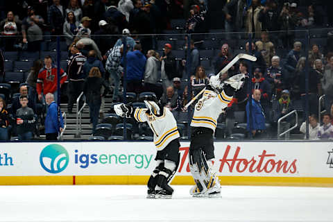 COLUMBUS, OH – APRIL 04: Linus Ullmark #35 of the Boston Bruins celebrates with Jeremy Swayman #1 after defeating the Columbus Blue Jackets 3-2 in overtime at Nationwide Arena on April 4, 2022, in Columbus, Ohio. (Photo by Kirk Irwin/Getty Images)