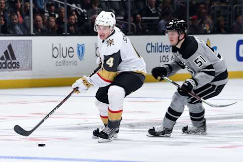 LOS ANGELES, CA – APRIL 6: Jimmy Schuldt #4 of the Vegas Golden Knights skates with the puck with pressure from Austin Wagner #51 of the Los Angeles Kings during Schuldt’s NHL debut in the second period of the game at STAPLES Center on April 6, 2019 in Los Angeles, California. (Photo by Adam Pantozzi/NHLI via Getty Images)