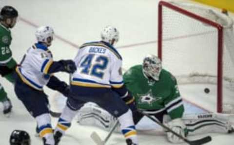 May 1, 2016; Dallas, TX, USA; St. Louis Blues center David Backes (42) scores the game winning goal against Dallas Stars goalie Antti Niemi (31) during the overtime period in game two of the first round of the 2016 Stanley Cup Playoffs at the American Airlines Center. The Blues win 4-3 in overtime. Mandatory Credit: Jerome Miron-USA TODAY Sports