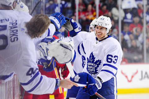 CALGARY, AB – MARCH 4: Tyler Ennis #63 of the Toronto Maple Leafs celebrates with the bench after scoring a hat trick against the Calgary Flames of the Toronto Maple Leafs during an NHL game at Scotiabank Saddledome on March 4, 2019 in Calgary, Alberta, Canada. (Photo by Derek Leung/Getty Images)