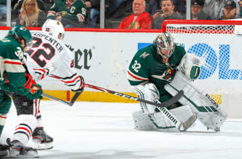 SAINT PAUL, MN – FEBRUARY 4: Alex Stalock #32 of the Minnesota Wild makes a save against Ryan Carpenter #22 of the Chicago Blackhawks during the game at the Xcel Energy Center on February 4, 2020, in Saint Paul, Minnesota. (Photo by Bruce Kluckhohn/NHLI via Getty Images)