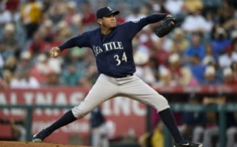 Aug 15, 2016; Anaheim, CA, USA; Seattle Mariners starting pitcher Felix Hernandez (34) pitches against the Los Angeles Angels during the first inning at Angel Stadium of Anaheim. Mandatory Credit: Kelvin Kuo-USA TODAY Sports