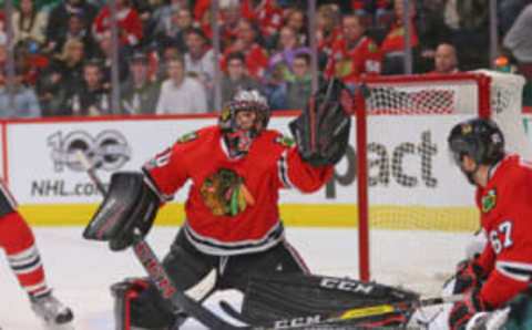 Mar 12, 2017; Chicago, IL, USA; Chicago Blackhawks goalie Corey Crawford (50) makes a save during the third period against the Minnesota Wild at the United Center. Chicago won 4-2. Mandatory Credit: Dennis Wierzbicki-USA TODAY Sports