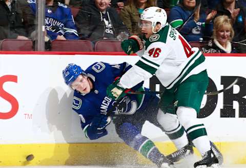 VANCOUVER, BC – OCTOBER 29: Jared Spurgeon #46 of the Minnesota Wild checks Elias Pettersson #40 of the Vancouver Canucks during their NHL game at Rogers Arena October 29, 2018 in Vancouver, British Columbia, Canada. Vancouver won 5-2. (Photo by Jeff Vinnick/NHLI via Getty Images)