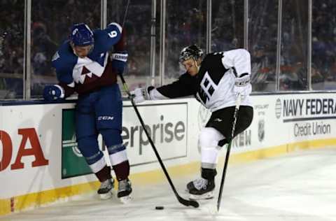 COLORADO SPRINGS, COLORADO – FEBRUARY 15: Erik Johnson #6 of the Colorado Avalanche fights for the puck against Matt Roy #3 of the Los Angeles Kings in the third period during the 2020 NHL Stadium Series game at Falcon Stadium on February 15, 2020 in Colorado Springs, Colorado. (Photo by Matthew Stockman/Getty Images)