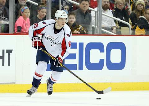 Jan 16, 2017; Pittsburgh, PA, USA; Washington Capitals left wing Andre Burakovsky (65) skates with the puck against the Pittsburgh Penguins during the first period at the PPG PAINTS Arena. The Penguins won 8-7 in overtime. Mandatory Credit: Charles LeClaire-USA TODAY Sports