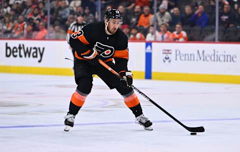 Mar 23, 2023; Philadelphia, Pennsylvania, USA; Philadelphia Flyers center Kevin Hayes (13) controls the puck against the Minnesota Wild in the third period at Wells Fargo Center. Mandatory Credit: Kyle Ross-USA TODAY Sports