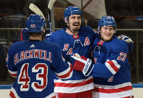 Colin Blackwell #43, Chris Kreider #20 and Adam Fox #23 of the New York Rangers (Photo by Bruce Bennett/Getty Images)