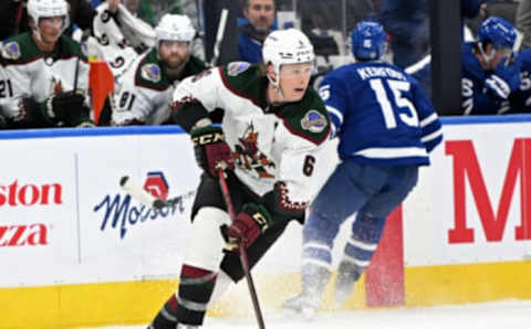 Mar 10, 2022; Toronto, Ontario, CAN; Arizona Coyotes defenseman Jakob Chychrun (6) carries the puck up ice against the Toronto Maple Leafs in the third period at Scotiabank Arena. Mandatory Credit: Dan Hamilton-USA TODAY Sports