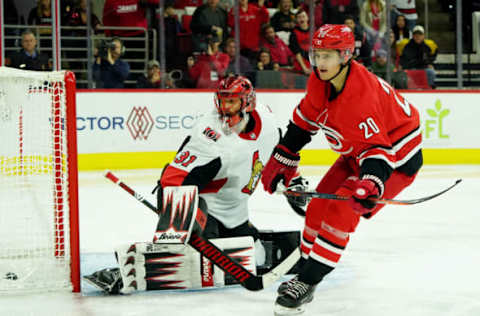 RALEIGH, NC – NOVEMBER 11: Sebastian Aho #20 of the Carolina Hurricanes fires a short handed goal past Anders Nilsson #31 of the Ottawa Senators during an NHL game on November 11, 2019 at PNC Arena in Raleigh, North Carolina. (Photo by Gregg Forwerck/NHLI via Getty Images)