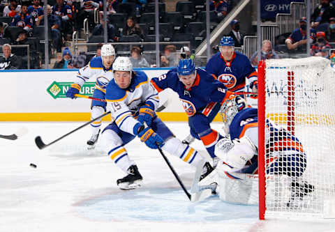 ELMONT, NEW YORK – DECEMBER 30: Semyon Varlamov #40 of the New York Islanders makes the third period save on John Hayden #15 of the Buffalo Sabres at the UBS Arena on December 30, 2021 in Elmont, New York. (Photo by Bruce Bennett/Getty Images)