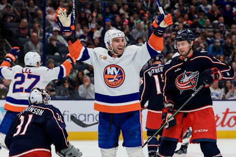 Mar 24, 2023; Columbus, Ohio, USA; New York Islanders center Kyle Palmieri (21) celebrates after a goal scored by center Brock Nelson (29) in the game against the Columbus Blue Jackets in the third period at Nationwide Arena. Mandatory Credit: Aaron Doster-USA TODAY Sports