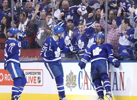 Toronto Maple Leafs center Auston Matthews (34) celebrates his third period goal with left wing James van Riemsdyk (25) against the Washington Capitals in game six of the first round of the 2017 Stanley Cup Playoffs (Tom Szczerbowski-USA TODAY Sports)