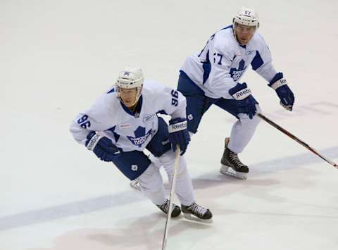 TORONTO, ON – JULY 10 – Toronto Maple Leafs prospect defencemen Tom Nilsson, left, and Andrew MacWilliam during scrimmage action at the Leaf’s 2013 prospect camp at the MasterCard Centre For Hockey Excellence. July 10, 2013. Chris So/Toronto Star (Chris So/Toronto Star via Getty Images)