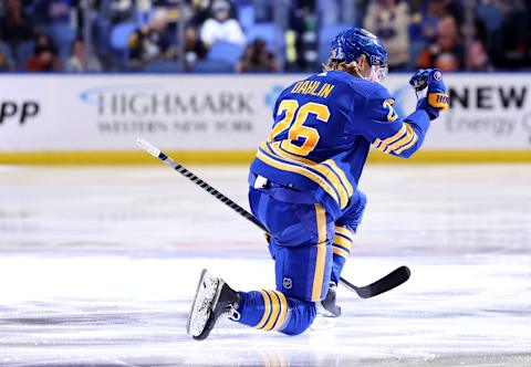 Apr 23, 2022; Buffalo, New York, USA; Buffalo Sabres defenseman Rasmus Dahlin (26) celebrates his goal during the second period against the New York Islanders at KeyBank Center. Mandatory Credit: Timothy T. Ludwig-USA TODAY Sports