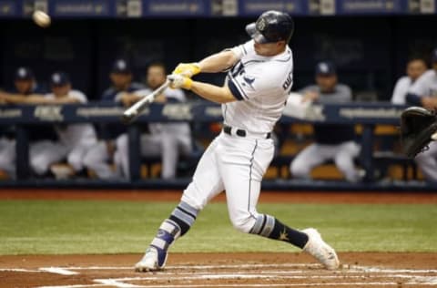 May 20, 2017; St. Petersburg, FL, USA; Tampa Bay Rays designated hitter Corey Dickerson (10) hits a home run during the first inning against the New York Yankees at Tropicana Field. Mandatory Credit: Kim Klement-USA TODAY Sports