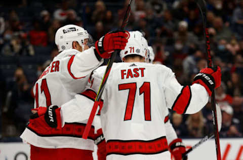 COLUMBUS, OH – OCTOBER 23: Jesper Fast #71 of the Carolina Hurricanes is congratulated by Jordan Staal #11 after scoring a goal during the game against the Columbus Blue Jackets at Nationwide Arena on October 23, 2021, in Columbus, Ohio. (Photo by Kirk Irwin/Getty Images)