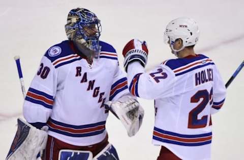 Nov 15, 2016; Vancouver, British Columbia, CAN; New York Rangers goaltender Antti Raanta (22) congratulates goaltender Henrik Lundqvist (30) for the win during the third period at Rogers Arena. The New York Rangers won 7-2. Mandatory Credit: Anne-Marie Sorvin-USA TODAY Sports