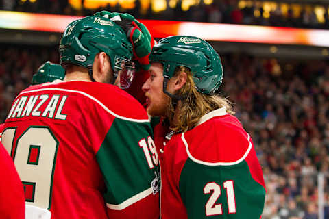 ST. PAUL, MN – FEBRUARY 27: Minnesota Wild center Martin Hanzal (19) and right wing Ryan White (21) celebrate after the Wild won in overtime during the regular season game between the Los Angeles Kings and the Minnesota Wild on February 27, 2017 at Xcel Energy Center in St. Paul, Minnesota. The Wild won 5-4 in overtime. (Photo by David Berding/Icon Sportswire via Getty Images)