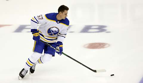 May 6, 2021; Pittsburgh, Pennsylvania, USA; Buffalo Sabres left wing Brett Murray (57) warms up before making his NHL debut against the Pittsburgh Penguins at PPG Paints Arena. Mandatory Credit: Charles LeClaire-USA TODAY Sports