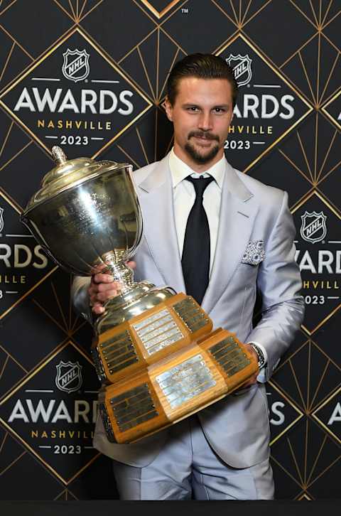 Jun 26, 2023; Nashville, Tennessee, USA; San Jose Sharks defenseman Erik Karlsson poses with the James Norris Memorial Trophy during the 2023 NHL Awards at Bridgestone Arena. Mandatory Credit: Christopher Hanewinckel-USA TODAY Sports