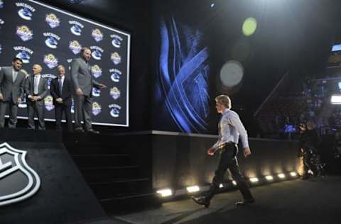 Jun 26, 2015; Sunrise, FL, USA; Brock Boeser walks to the stage after being selected as the number twenty-three overall pick to the Vancouver Canucks in the first round of the 2015 NHL Draft at BB&T Center. Mandatory Credit: Steve Mitchell-USA TODAY Sports