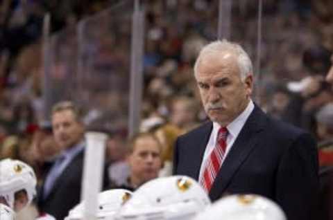 Jan 30, 2013; St. Paul, MN, USA; Chicago Blackhawks head coach Joel Quenneville against the Minnesota Wild at the Xcel Energy Center. The Wild defeated the Blackhawks 3-2 in a shootout. Mandatory Credit: Brace Hemmelgarn-USA TODAY Sports