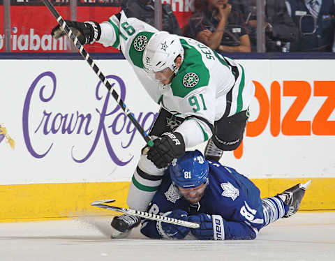 TORONTO, ON – DECEMBER 2: Tyler Seguin #91 of the Dallas Stars knocks Phil Kessel #81 ofthe Toronto Maple Leafs. (Photo by Claus Andersen/Getty Images)