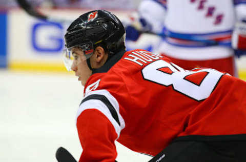 NEWARK, NJ – OCTOBER 17: New Jersey Devils center Jack Hughes (86) faces off during the second period of the National Hockey League game between the New Jersey Devils and the New York Rangers on October 17, 2019 at the Prudential Center in Newark, NJ. (Photo by Rich Graessle/Icon Sportswire via Getty Images)