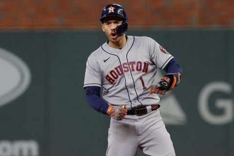 ATLANTA, GEORGIA – OCTOBER 31: Carlos Correa #1 of the Houston Astros celebrates after hitting an RBI double against the Atlanta Braves during the third inning in Game Five of the World Series at Truist Park on October 31, 2021 in Atlanta, Georgia. (Photo by Kevin C. Cox/Getty Images)