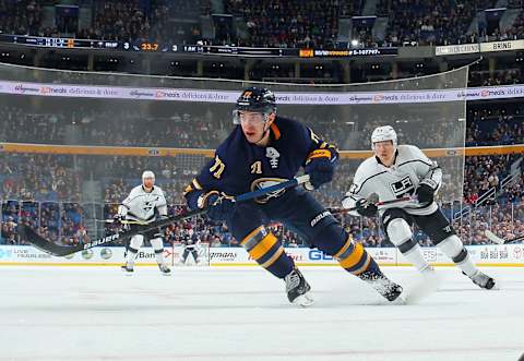 BUFFALO, NY – DECEMBER 11: Evan Rodrigues #71 of the Buffalo Sabres and Dustin Brown #23 of the Los Angeles Kings follow the play during an NHL game on December 11, 2018 at KeyBank Center in Buffalo, New York. Buffalo won, 4-3. (Photo by Bill Wippert/NHLI via Getty Images)