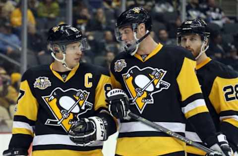 Vegas Golden Knights: Pittsburgh Penguins center Sidney Crosby (87) and defenseman Brian Dumoulin (8) talk prior to a face-off against the Nashville Predators during the third period at the PPG PAINTS Arena. The Penguins won 4-2. Mandatory Credit: Charles LeClaire-USA TODAY Sports