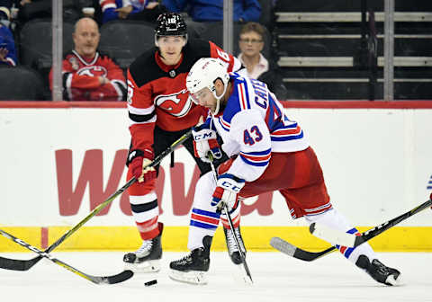 NEWARK, NJ – SEPTEMBER 23: New York Rangers left wing Daniel Catenacci (43) attempt to corral a wobbling puck during a preseason NHL game between the New Jersey Devils and New York Rangers on September 23, 2017 at Prudential Center in Newark, NJ. (Photo by Nick Wosika/Icon Sportswire via Getty Images)