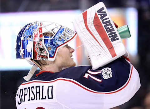 Apr 9, 2017; Toronto, Ontario, CAN; Columbus Blue Jackets goalie Joonas Korpisalo (70) spills water on his face during a break in the action against the Toronto Maple Leafs at Air Canada Centre. The Blue Jackets beat the Maple Leafs 3-2. Mandatory Credit: Tom Szczerbowski-USA TODAY Sports