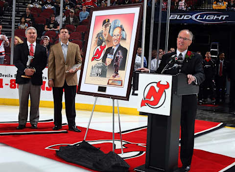 New Jersey Devils television announcer Mike ‘Doc’ Emrick speaks to the fans. (Photo by Jim McIsaac/Getty Images)