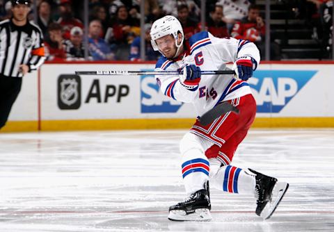 NEWARK, NEW JERSEY – APRIL 18: Jacob Trouba #8 of the New York Rangers skates against the New Jersey Devils during Game One in the First Round of the 2023 Stanley Cup Playoffs at the Prudential Center on April 18, 2023 in Newark, New Jersey. (Photo by Bruce Bennett/Getty Images)