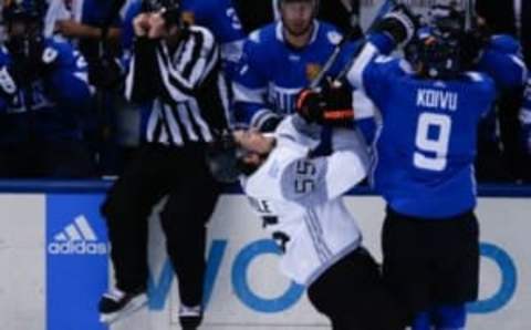 Sep 18, 2016; Toronto, Ontario, Canada; Team Finland Center Mikko Koivu (9) checks Team North America Center Mark Scheifele (55) in the third period during preliminary round play in the 2016 World Cup of Hockey at Air Canada Centre. Team North America 4-1. Mandatory Credit: Kevin Sousa-USA TODAY Sports