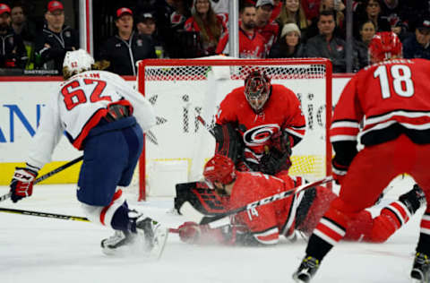 RALEIGH, NC – DECEMBER 28: Petr Mrazek #34 of the Carolina Hurricanes makes a save on a shot by Carl Hagelin #62 of the Washington Capitals during an NHL game on December 28, 2019 at PNC Arena in Raleigh, North Carolina. (Photo by Gregg Forwerck/NHLI via Getty Images)