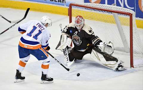 HERSHEY, PA – MARCH 16: Hershey Bears goalie Ilya Samsonov (35) makes a save on Bridgeport Sound Tigers right wing Tanner Fritz (11) during the Bridgeport Sound Tigers vs. the Hershey Bears AHL hockey game March 16, 2019 at the Giant Center in Hershey, PA. (Photo by Randy Litzinger/Icon Sportswire via Getty Images)