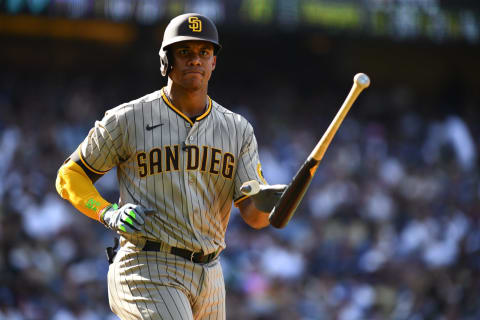 Aug 7, 2022; Los Angeles, California, USA; San Diego Padres right fielder Juan Soto (22) tosses his bat after getting walked against the Los Angeles Dodgers during fourth inning at Dodger Stadium. Mandatory Credit: Jonathan Hui-USA TODAY Sports