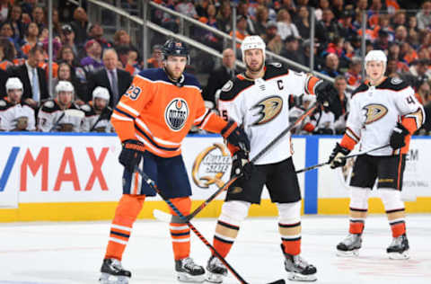 EDMONTON, AB – MARCH 25: Leon Draisaitl #29 of the Edmonton Oilers battles for position with Ryan Getzlaf #15 of the Anaheim Ducks on March 25, 2018, at Rogers Place. (Photo by Andy Devlin/NHLI via Getty Images)