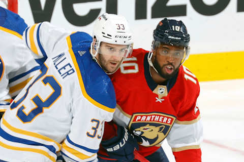 SUNRISE, FL – APRIL 8: Colin Miller #33 of the Buffalo Sabres defends against Anthony Duclair #10 of the Florida Panthers in front of the net at the FLA Live Arena on April 8, 2022 in Sunrise, Florida. (Photo by Joel Auerbach/Getty Images)