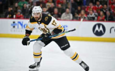 CHICAGO, ILLINOIS – MARCH 15: Nick Foligno #17 of the Boston Bruins skates in his 1,000th NHL game against the Chicago Blackhawks on March 15, 2022, at the United Center in Chicago, Illinois. (Photo by Jamie Sabau/Getty Images)