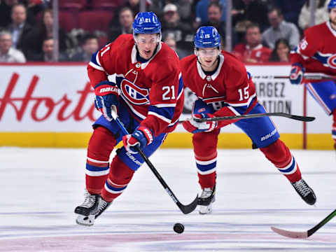 MONTREAL, QC – JANUARY 13: Nick Cousins #21 of the Montreal Canadiens skates the puck followed by teammate Jesperi Kotkaniemi #15 during the second period against the Calgary Flames at the Bell Centre on January 13, 2020 in Montreal, Canada. The Montreal Canadiens defeated the Calgary Flames 2-0. (Photo by Minas Panagiotakis/Getty Images)