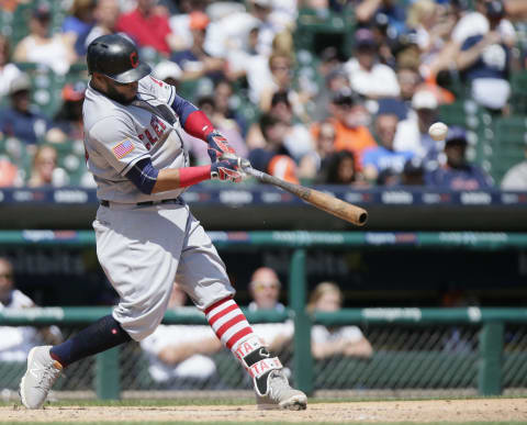 Batting from the right side, switch-hitter Santana will be problematic for opposing managers in the late innings. Photo by Duane Burleson/Getty Images.