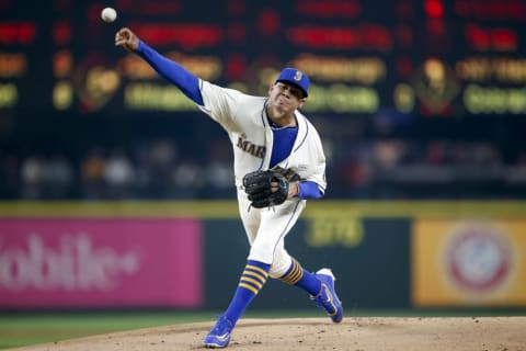 May 15, 2016; Seattle, WA, USA; Seattle Mariners starting pitcher Felix Hernandez (34) throws out a pitch against the Los Angeles Angels during the first inning at Safeco Field. Mandatory Credit: Jennifer Buchanan-USA TODAY Sports