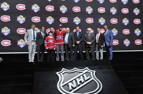 Jun 26, 2015; Sunrise, FL, USA; Noah Juulsen on stage with team executives after being selected as the number twenty-six overall pick to the Montreal Canadiens in the first round of the 2015 NHL Draft at BB&T Center. Mandatory Credit: Steve Mitchell-USA TODAY Sports