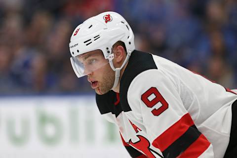 TAMPA, FL – NOVEMBER 25: New Jersey Devils left wing Taylor Hall (9) skates after taking a puck to the mouth during the regular season NHL game between the New Jersey Devils and Tampa Bay Lightning on November 25, 2018 at Amalie Arena in Tampa, FL. (Photo by Mark LoMoglio/Icon Sportswire via Getty Images)